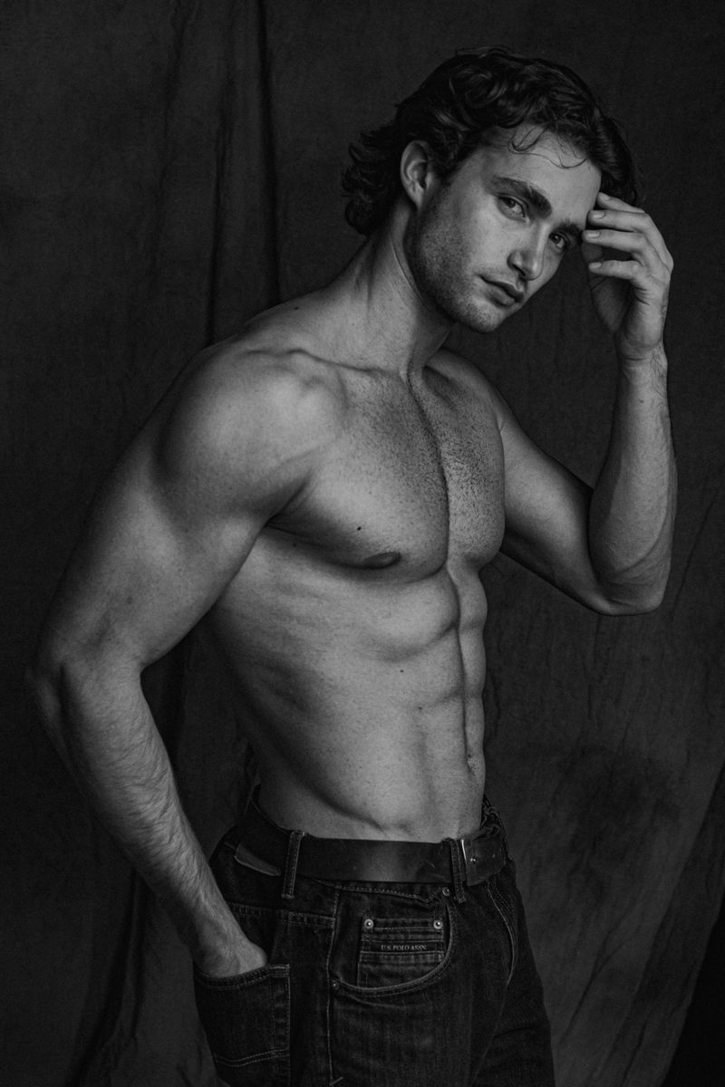 Pascal Sander shirtless studio portrait, hand in hair