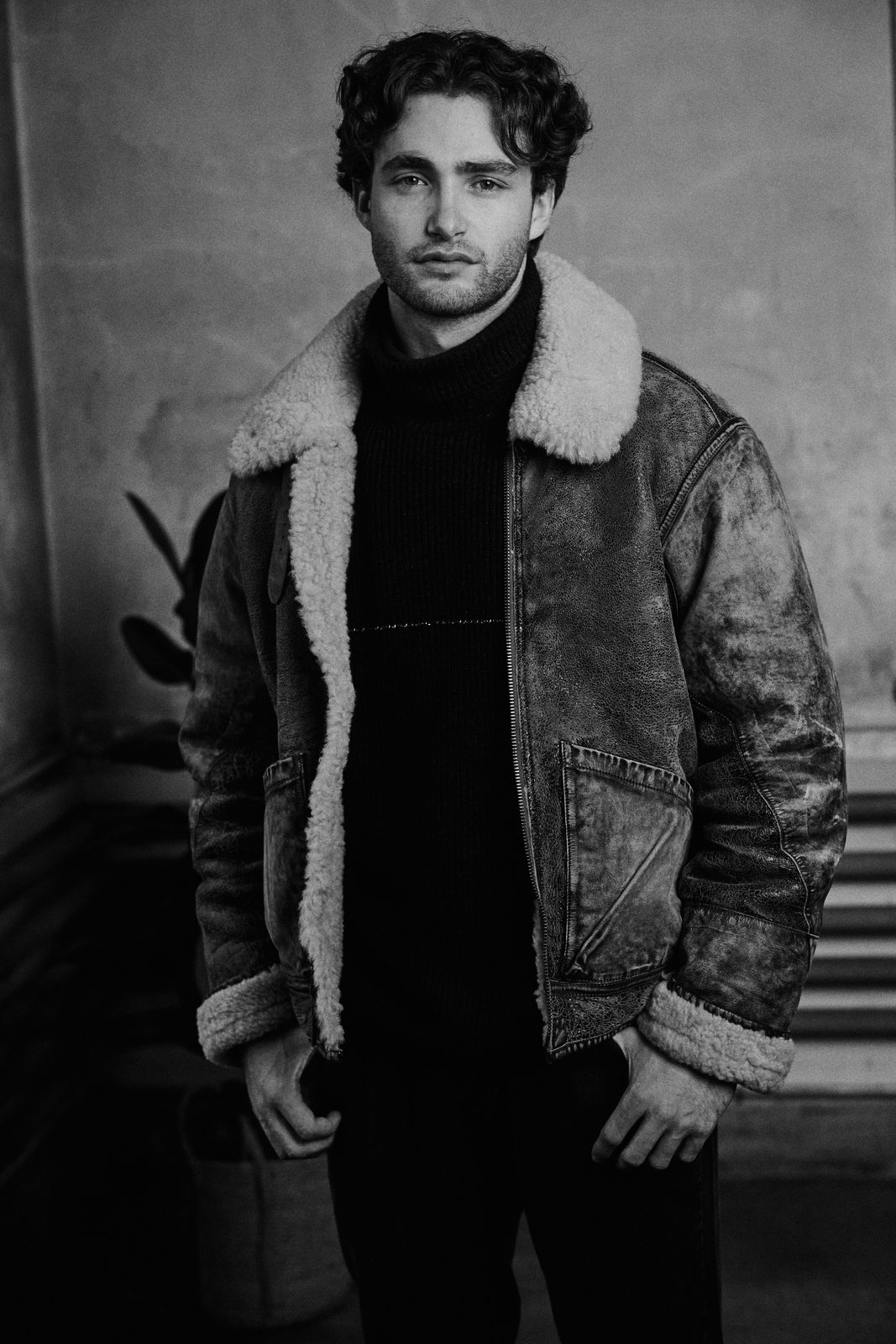 Pascal Sander in a shearling jacket, black and white