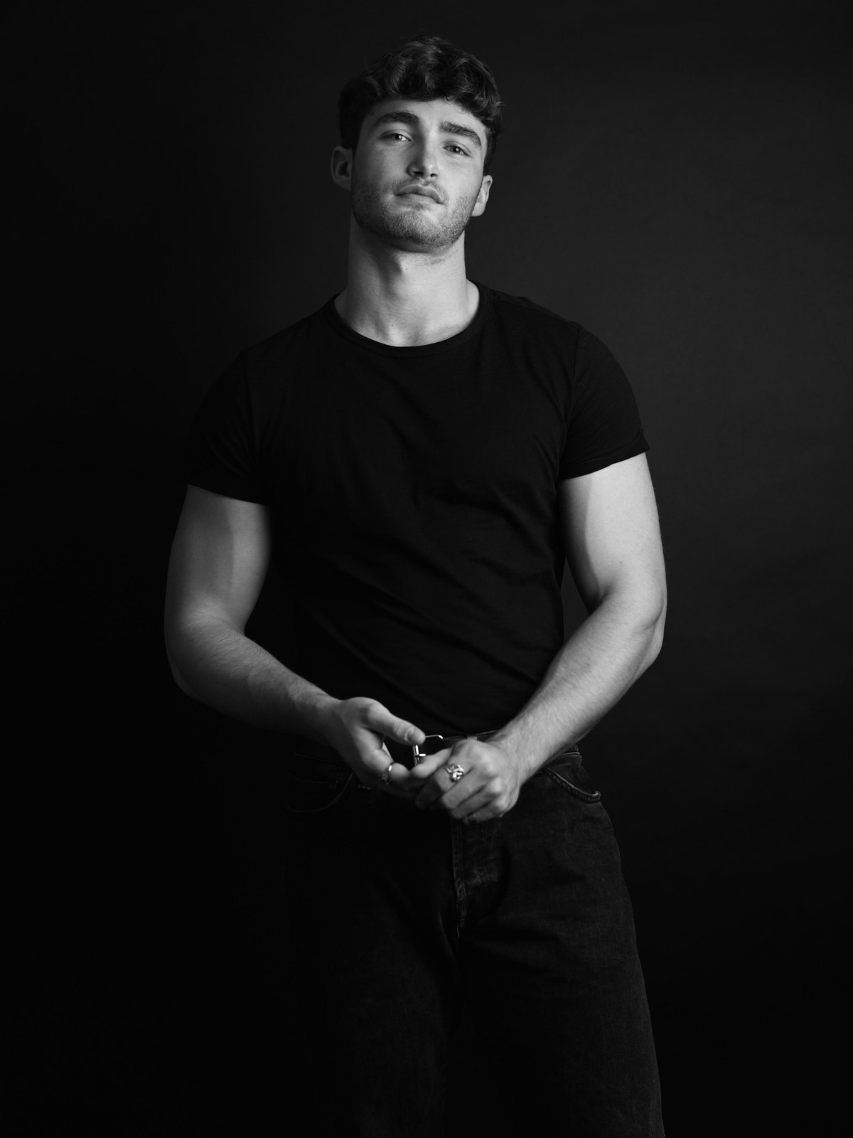 Pascal Sander, black-and-white studio portrait in a black t-shirt