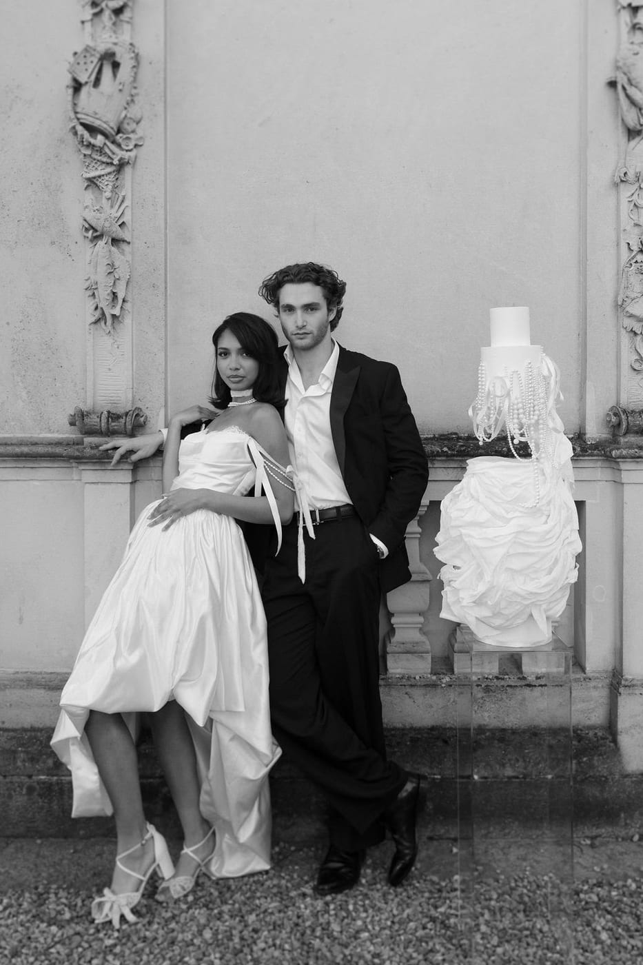 Pascal Sander and a partner in formalwear, black and white